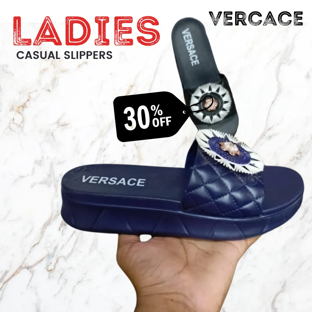 Slippers by Versace