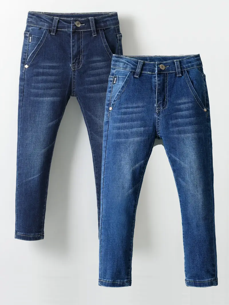 Mid Waist Straight Leg Jeans With Pockets.