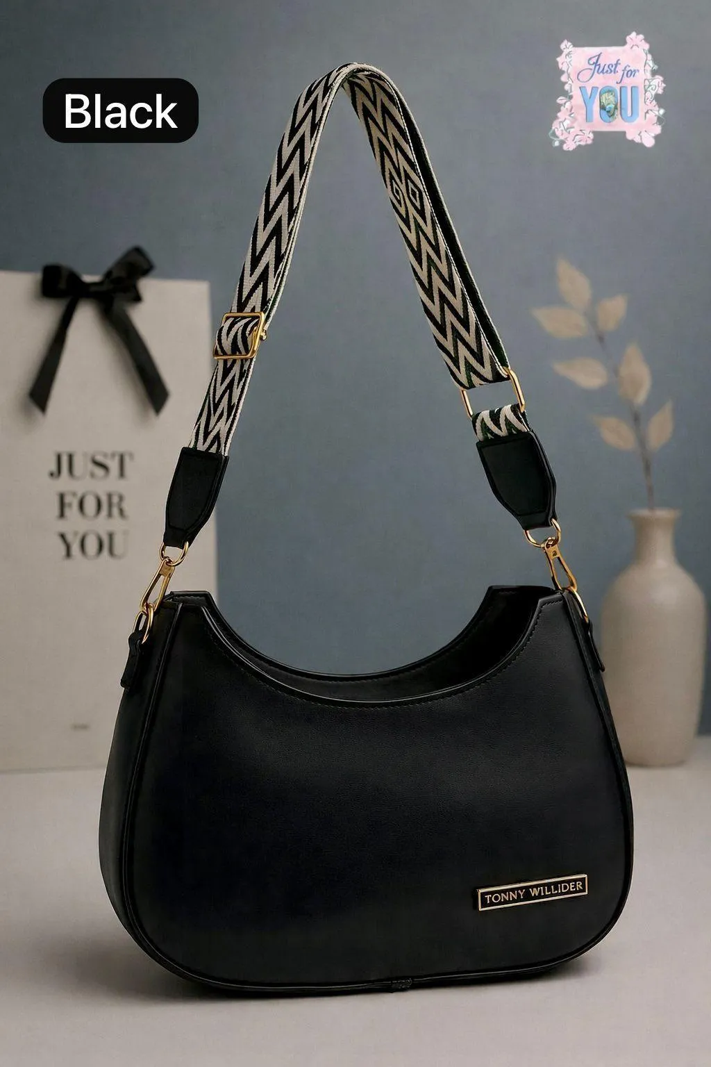 Chic Noir: Classic Black Shoulder Bag with Statement Chevron