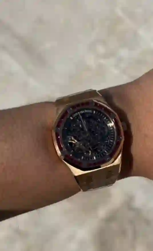 Audemars Piguet Royal Oak Double Balance Wheel Openworked 41 mm in rose gold with a factory ruby-set bezel.